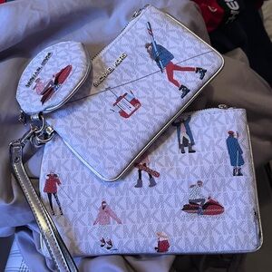 3 Michael Kors leather wristlets never used but no tags